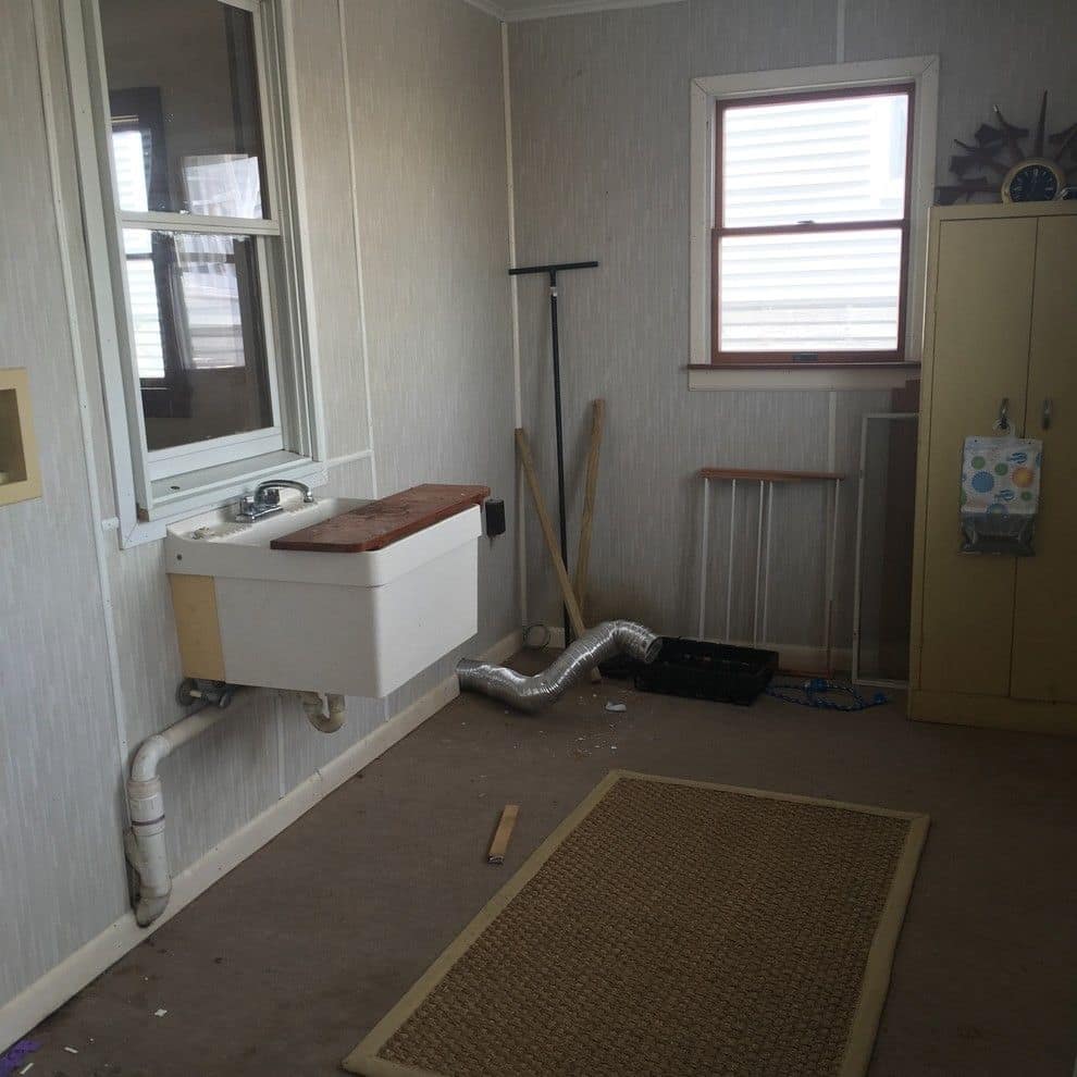Before: the laundry corner with a utility sink