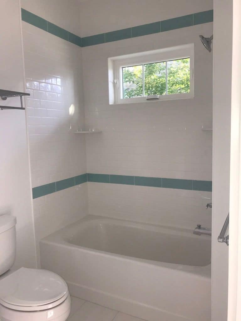 Tub and shower with an aqua tile band