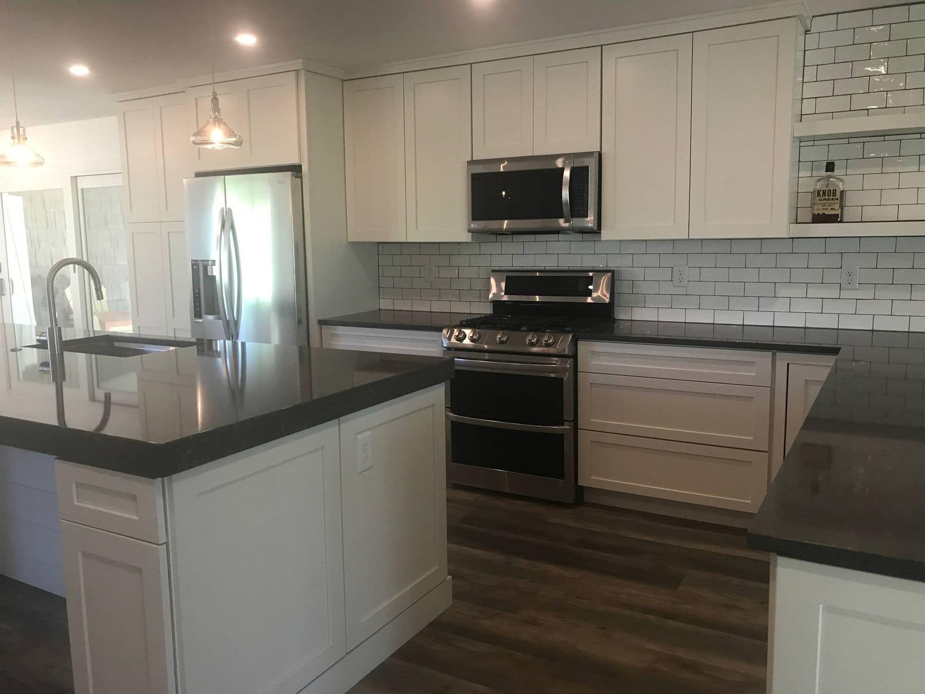 The range wall in white subway tile